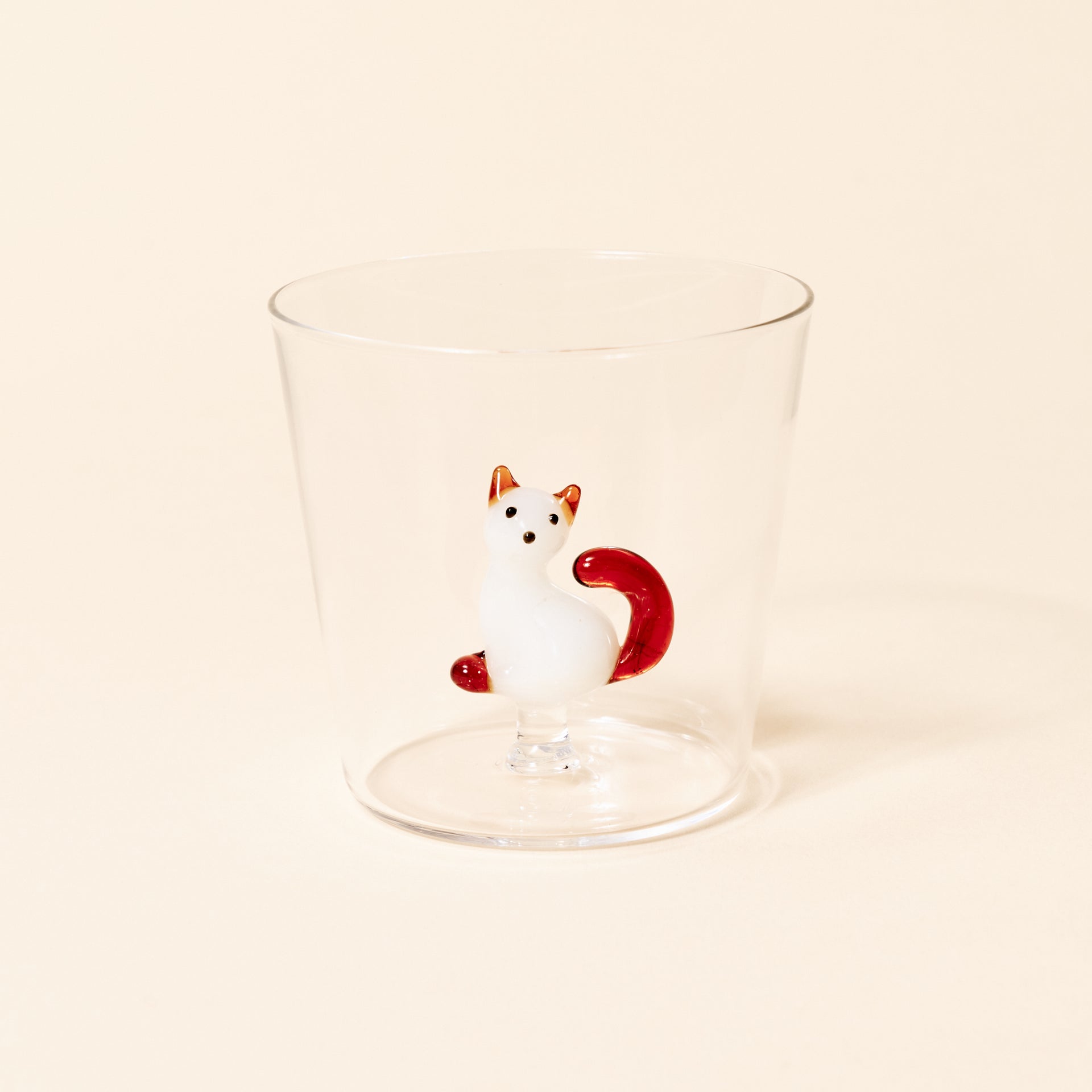 sitting white cat amber tail