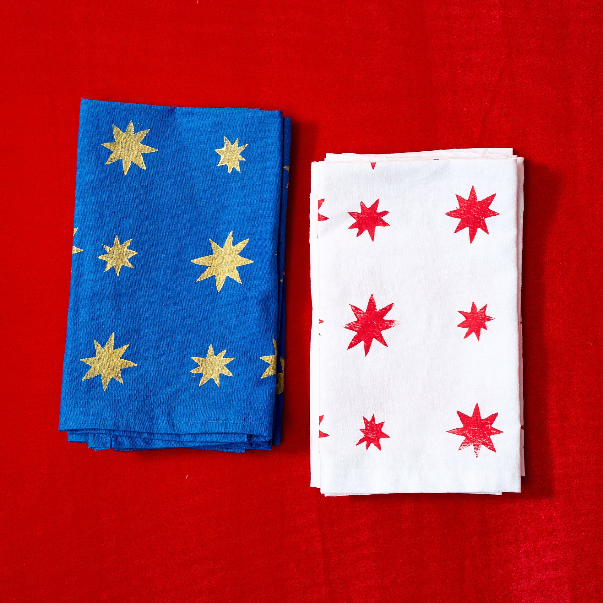white / red star, blue / gold star